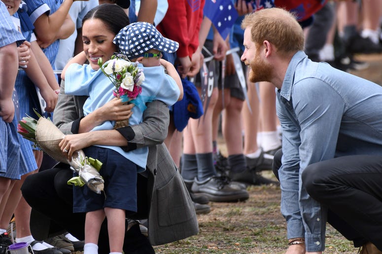 Prince Harry Duke of Sussex and Meghan Duchess of Sussex arrive at Dubbo Airport where they meet Luke Vincent, 5, from Buninyong Public School Kindergarten, New South Wales, Australia. Prince Harry Duke of Sussex and Meghan Duchess of Sussex arrive at Dubbo Airport where they meet Luke Vincent, 5, from Buninyong Public School Kindergarten, New South Wales, Australia.