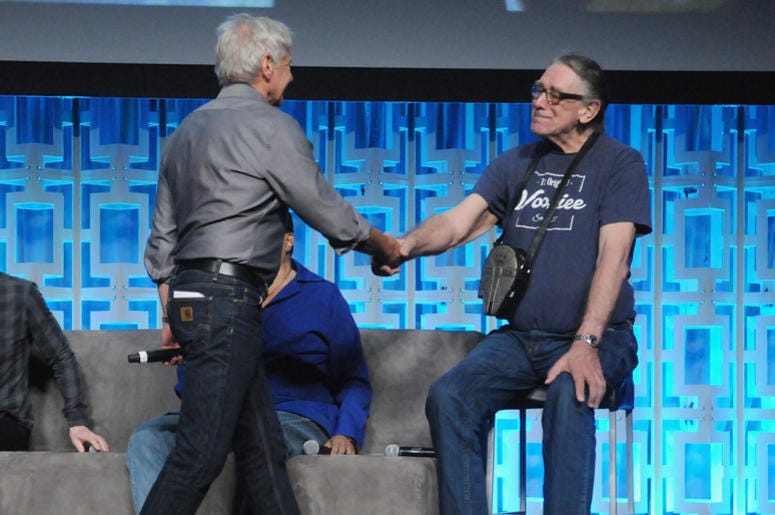Harrison Ford and Peter Mayhew attend the 40 Years of Star Wars panel during the 2017 Star Wars Celebration Harrison Ford and Peter Mayhew attend the 40 Years of Star Wars panel during the 2017 Star Wars Celebration