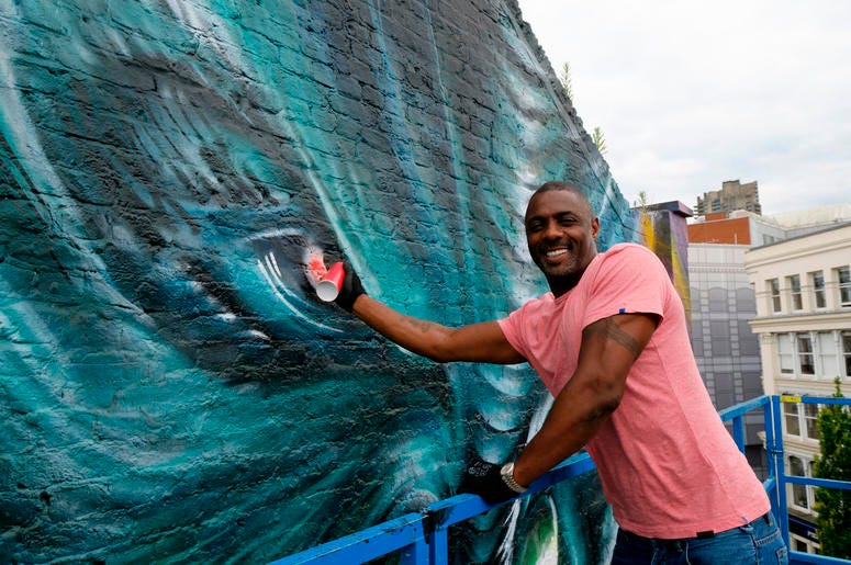 Idris Elba paints in the eye of his character "Krall" during the unveiling of a Star Trek Beyond mural by artist Jim Vision in Clerkenwell, London. Idris Elba paints in the eye of his character "Krall" during the unveiling of a Star Trek Beyond mural by artist Jim Vision in Clerkenwell, London.