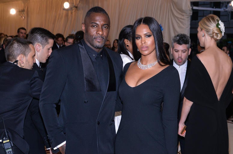 Idris Elba and Sabrina Dhowre walking on the red carpet at The Metropolitan Museum of Art Costume Institute Benefit celebrating the opening of Heavenly Bodies : Fashion and the Catholic Imagination held at The Metropolitan Museum of Art in New York, NY, o Idris Elba and Sabrina Dhowre walking on the red carpet at The Metropolitan Museum of Art Costume Institute Benefit celebrating the opening of Heavenly Bodies : Fashion and the Catholic Imagination held at The Metropolitan Museum of Art in New York, NY, o