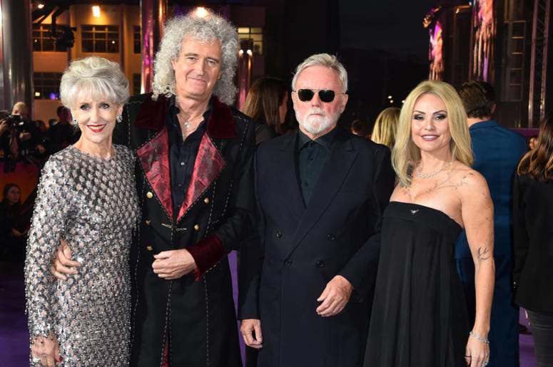 Brian May with wife Anita Dobson with Roger Taylor and wife Sarina Potgieter attending the Bohemian Rhapsody World Premiere held at the the SSE Arena, Wembley, London. Brian May with wife Anita Dobson with Roger Taylor and wife Sarina Potgieter attending the Bohemian Rhapsody World Premiere held at the the SSE Arena, Wembley, London.