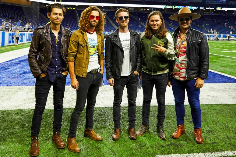 his Sept. 10, 2018 file photo shows members of the band LANCO on the field before a NFL football game between the Detroit Lions and the New York Jets in Detroit. DO NOT USE
