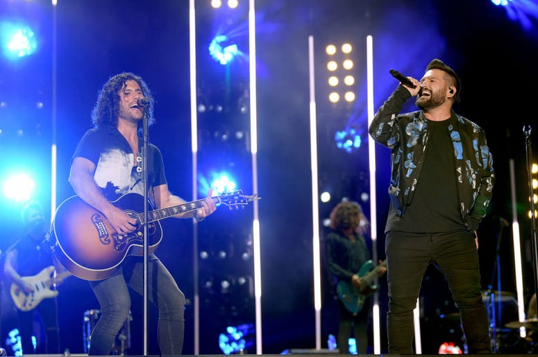 Dan Smyers and Shay Mooney of Dan + Shay perform on stage Dan Smyers and Shay Mooney of Dan + Shay perform on stage
