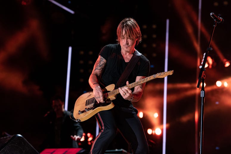 Keith Urban performs on stage Keith Urban performs on stage