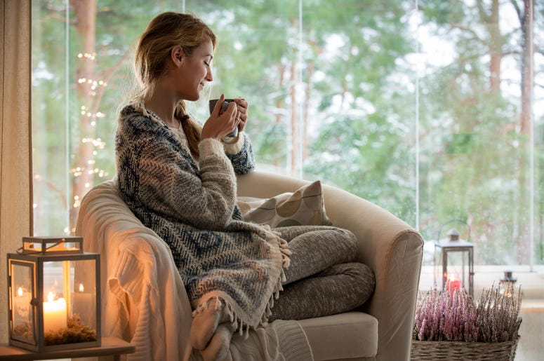 Woman relaxing with cup