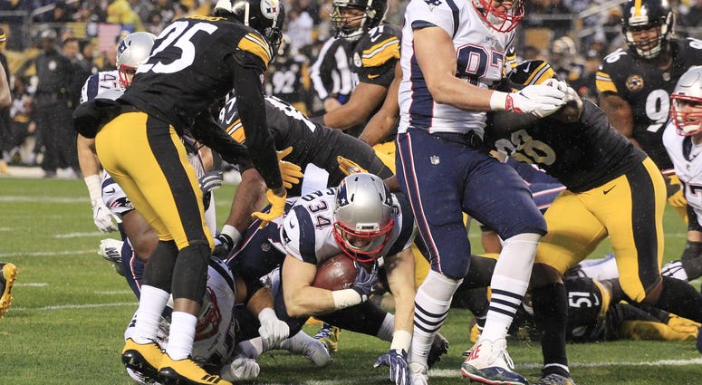 Rex Burkhead scored the Patriots' first touchdown, but later left the game injured and didn't return. (USA Today Sports)