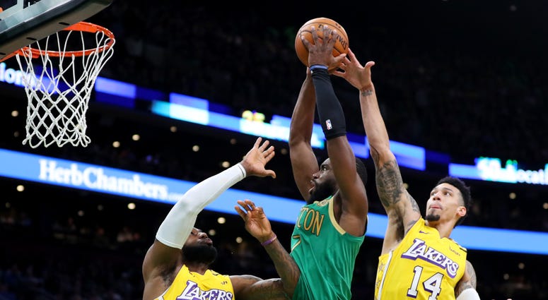 Jaylen Brown dunks on LeBron James