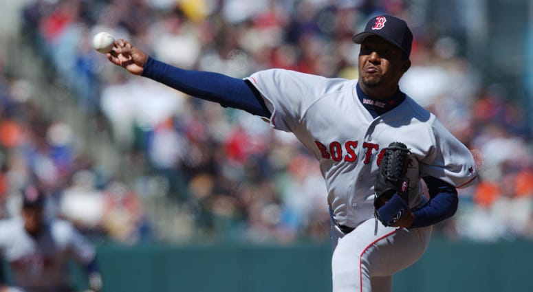 Pedro Martinez delivers a pitch for the Red Sox back in 2002