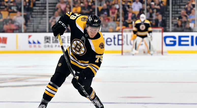 NHL: Chicago Blackhawks at Boston Bruins Sep 25, 2017; Boston, MA, USA; Boston Bruins defenseman Jeremy Lauzon (79) shoots the puck against the Chicago Blackhawks during the first period at the TD Garden. Mandatory Credit: Brian Fluharty-USA TODAY Sports