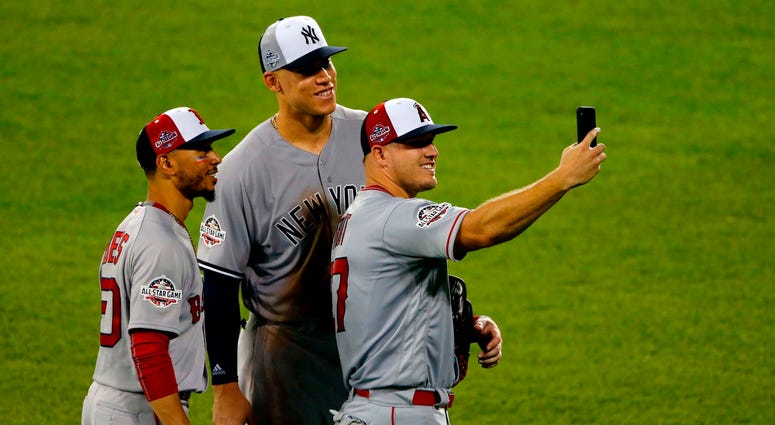 Mike Trout, Mookie Betts, and Aaron Judge take a selfie Mike Trout, Mookie Betts, and Aaron Judge take a selfie
