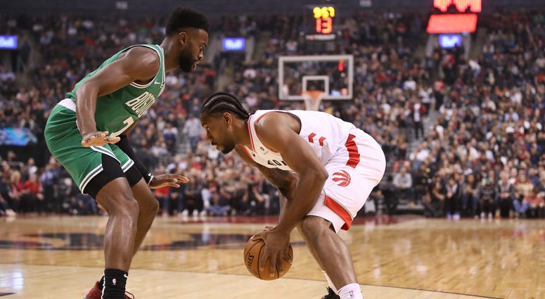 Celtics forward Jaylen Brown and Raptors forward Kawhi Leonard