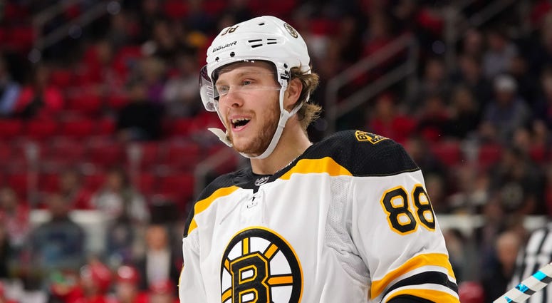 NHL: Boston Bruins at Carolina Hurricanes Oct 30, 2018; Raleigh, NC, USA; Boston Bruins right wing David Pastrnak (88) looks on during the game against the Carolina Hurricanes at PNC Arena. The Boston Bruins defeated the Carolina Hurricanes 3-2. Mandatory Credit: James Guillory-USA TODAY Sports