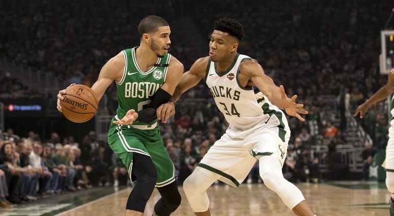 Boston Celtics forward Jayson Tatum and Milwaukee Bucks forward Giannis Antetokounmpo