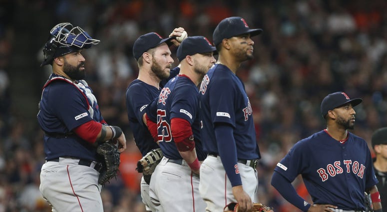 Boston Red Sox players Sandy Leon, Chris Sale, Steve Pearce, Xander Bogaerts, and Eduardo Nunez