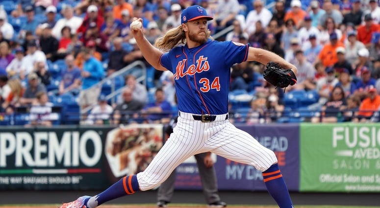 Noah Syndergaard delivers a pitch