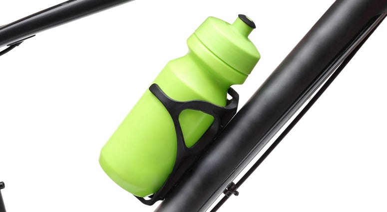 Water Bottle on bike cup holder Reusable green water bottle on bike cup holder