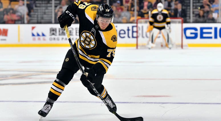NHL: Chicago Blackhawks at Boston Bruins Sep 25, 2017; Boston, MA, USA; Boston Bruins defenseman Jeremy Lauzon (79) shoots the puck against the Chicago Blackhawks during the first period at the TD Garden. Mandatory Credit: Brian Fluharty-USA TODAY Sports