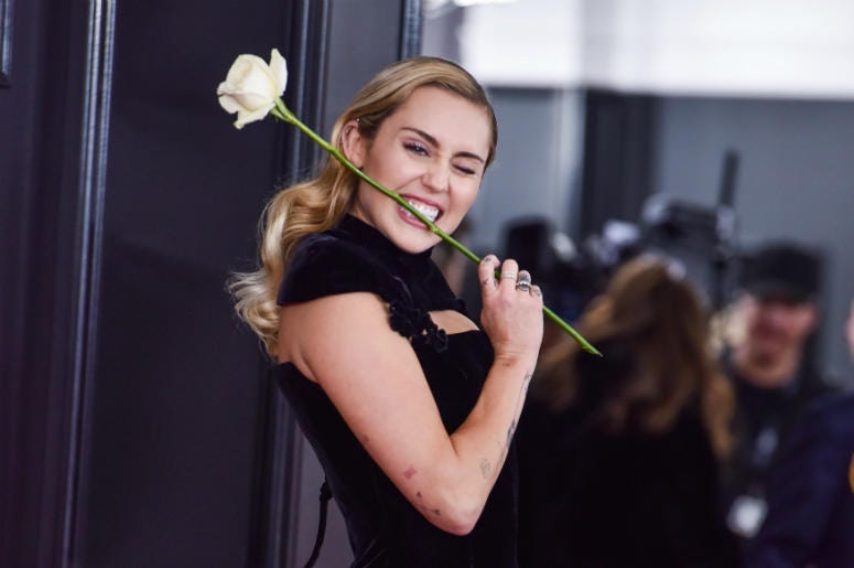 Miley Cyrus arrives at the 60th Annual GRAMMY Awards Miley Cyrus arrives at the 60th Annual GRAMMY Awards