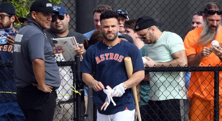 The Astros' Jose Altuve finishes signing autographs before the morning spring training workout on Feb. 13, 2020, in West Palm Beach, Florida. The Astros' Jose Altuve finishes signing autographs before the morning spring training workout on Feb. 13, 2020, in West Palm Beach, Florida.