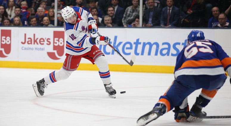 Rangers left wing Artemi Panarin shoots against the Islanders on Feb. 25, 2020, at Nassau Veterans Memorial Coliseum. Rangers left wing Artemi Panarin shoots against the Islanders on Feb. 25, 2020, at Nassau Veterans Memorial Coliseum.
