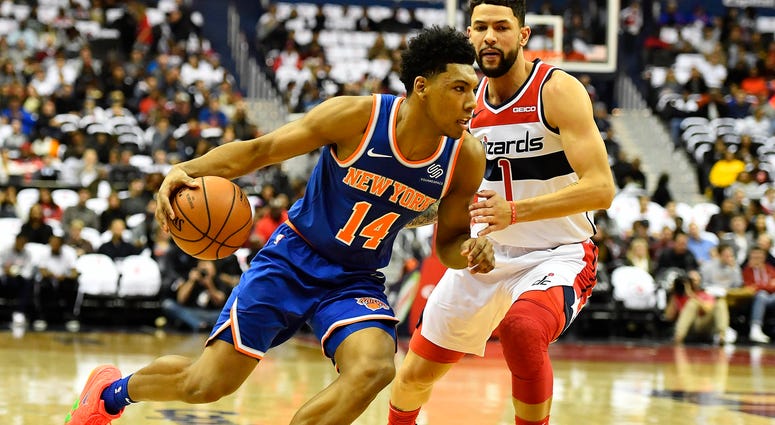 Nov 4, 2018; Washington, DC, USA; New York Knicks guard Allonzo Trier (14) dribbles past Washington Wizards guard Austin Rivers (1) during the first half at Capital One Arena. Mandatory Credit: Brad Mills-USA TODAY Sports Nov 4, 2018; Washington, DC, USA; New York Knicks guard Allonzo Trier (14) dribbles past Washington Wizards guard Austin Rivers (1) during the first half at Capital One Arena. Mandatory Credit: Brad Mills-USA TODAY Sports