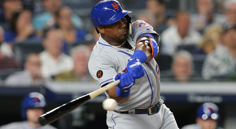 The Mets' Yoenis Cespedes (52) hits a single against the New York Yankees on July 20, 2018, at Yankee Stadium. The Mets' Yoenis Cespedes (52) hits a single against the New York Yankees on July 20, 2018, at Yankee Stadium.