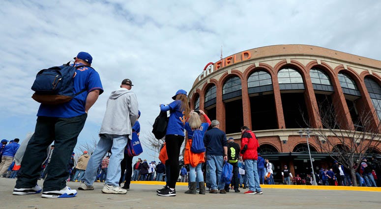 Fans wait in line outside Citi Field. Fans wait in line outside Citi Field.