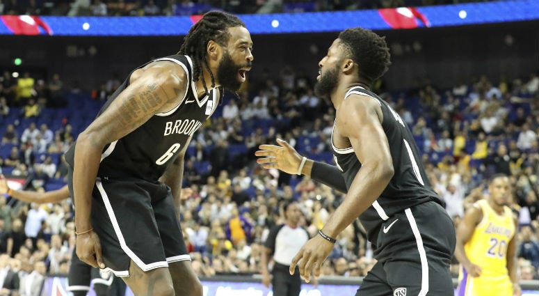 Brooklyn Nets' DeAndre Jordan, left, David Nwaba celebrate beating the Los Angeles Lakers in a preseason NBA game in Shanghai, China, Thursday, Oct. 10, 2019. Brooklyn Nets' DeAndre Jordan, left, David Nwaba celebrate beating the Los Angeles Lakers in a preseason NBA game in Shanghai, China, Thursday, Oct. 10, 2019.