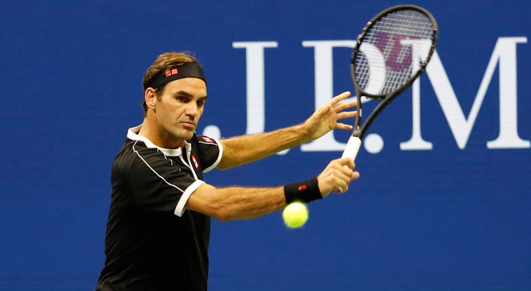 Roger Federer hits a backhand against Grigor Dimitrov in a quarterfinal match at the U.S. Open on Sept. 3, 2019. Roger Federer hits a backhand against Grigor Dimitrov in a quarterfinal match at the U.S. Open on Sept. 3, 2019.