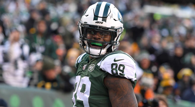 Chris Herndon #89 of the New York Jets reacts after scoring a touchdown against the Green Bay Packers Chris Herndon #89 of the New York Jets reacts after scoring a touchdown against the Green Bay Packers
