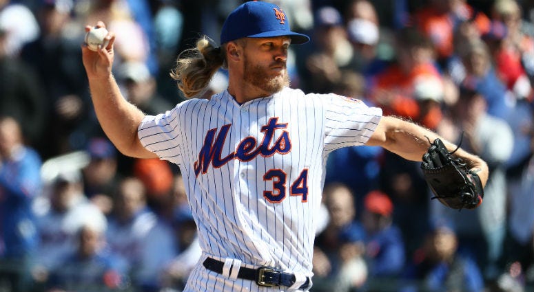 Noah Syndergaard pitches against the Washington Nationals during the Mets Home Opening game at Citi Field on April 04, 2019 in New York City. Noah Syndergaard pitches against the Washington Nationals during the Mets Home Opening game at Citi Field on April 04, 2019 in New York City.