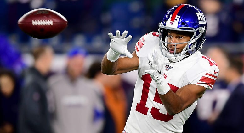 FOXBOROUGH, MASSACHUSETTS - OCTOBER 10: Golden Tate #15 of the New York Giants warms up prior to the game against the New England Patriots at Gillette Stadium on October 10, 2019 in Foxborough, Massachusetts FOXBOROUGH, MASSACHUSETTS - OCTOBER 10: Golden Tate #15 of the New York Giants warms up prior to the game against the New England Patriots at Gillette Stadium on October 10, 2019 in Foxborough, Massachusetts