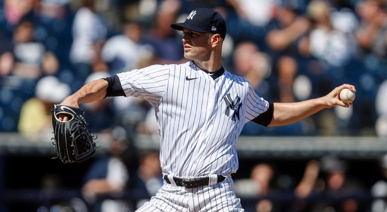 The Yankees' J.A. Happ throws a pitch against the Toronto Blue Jays on Feb. 22, 2020, at George M. Steinbrenner Field in Tampa, Florida. The Yankees' J.A. Happ throws a pitch against the Toronto Blue Jays on Feb. 22, 2020, at George M. Steinbrenner Field in Tampa, Florida.