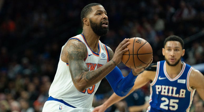 Knicks forward Marcus Morris shoots in front of 76ers guard Ben Simmons on Nov. 20, 2019, at Wells Fargo Center. Knicks forward Marcus Morris shoots in front of 76ers guard Ben Simmons on Nov. 20, 2019, at Wells Fargo Center.