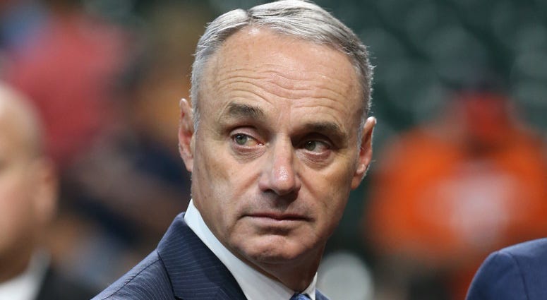 MLB commissioner Rob Manfred looks on before Game 2 of the World Series between the Astros and Nationals on Oct. 23, 2019, at Minute Maid Park in Houston. MLB commissioner Rob Manfred looks on before Game 2 of the World Series between the Astros and Nationals on Oct. 23, 2019, at Minute Maid Park in Houston.
