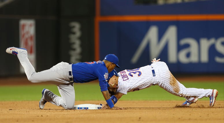 The Mets' Michael Conforto is tagged out by the Cubs' Addison Russell on an attempted steal during the sixth inning on Aug. 29, 2019. The Mets' Michael Conforto is tagged out by the Cubs' Addison Russell on an attempted steal during the sixth inning on Aug. 29, 2019.