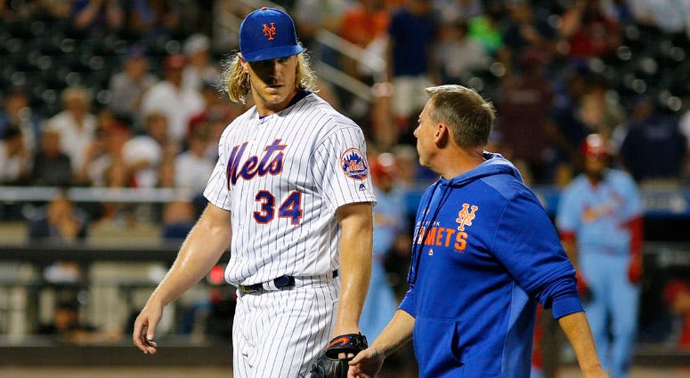 Mets pitcher Noah Syndergaard leaves the field with trainer Brian Chicklo with a leg injury against the St. Louis Cardinals during the seventh inning at Citi Field on June 15, 2019. Mets pitcher Noah Syndergaard leaves the field with trainer Brian Chicklo with a leg injury against the St. Louis Cardinals during the seventh inning at Citi Field on June 15, 2019.