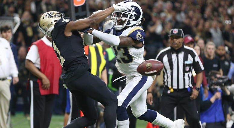 Jan 20, 2019; New Orleans, LA, USA; Los Angeles Rams defensive back Nickell Robey-Coleman breaks up a pass intended or New Orleans Saints wide receiver Tommylee Lewis during the fourth quarter of the NFC Championship game. Mandatory Credit: Chuck Cook-USA Jan 20, 2019; New Orleans, LA, USA; Los Angeles Rams defensive back Nickell Robey-Coleman breaks up a pass intended or New Orleans Saints wide receiver Tommylee Lewis during the fourth quarter of the NFC Championship game. Mandatory Credit: Chuck Cook-USA