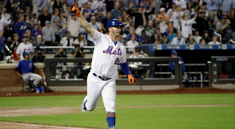 New York Mets' Pete Alonso trots the bases after hitting a solo home run during the fourth inning of a baseball game, Tuesday, Aug. 27, 2019, in New York. With the home run, Alonso broke the Mets' single season home run record. New York Mets' Pete Alonso trots the bases after hitting a solo home run during the fourth inning of a baseball game, Tuesday, Aug. 27, 2019, in New York. With the home run, Alonso broke the Mets' single season home run record.