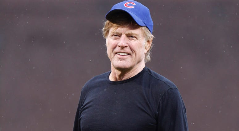 Actor Robert Redford smiles after throwing out the first pitch prior to the Chicago Cubs playing the Pittsburgh Pirates on opening day at Wrigley Field on April 1, 2011 in Chicago, Illinois Actor Robert Redford smiles after throwing out the first pitch prior to the Chicago Cubs playing the Pittsburgh Pirates on opening day at Wrigley Field on April 1, 2011 in Chicago, Illinois