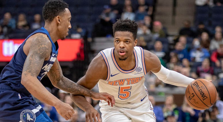 Knicks guard Dennis Smith Jr. dribbles the ball against Timberwolves guard Jeff Teague on March 10, 2018, at the Target Center in Minneapolis. Knicks guard Dennis Smith Jr. dribbles the ball against Timberwolves guard Jeff Teague on March 10, 2018, at the Target Center in Minneapolis.