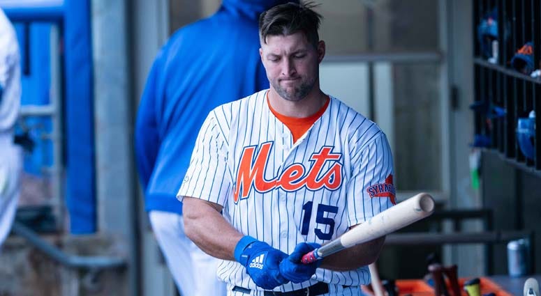 Syracuse Mets left fielder Tim Tebow prepares for an at-bat against the Buffalo Bisons on April 25, 2019, at NBT Bank Stadium in Syracuse. Syracuse Mets left fielder Tim Tebow prepares for an at-bat against the Buffalo Bisons on April 25, 2019, at NBT Bank Stadium in Syracuse.
