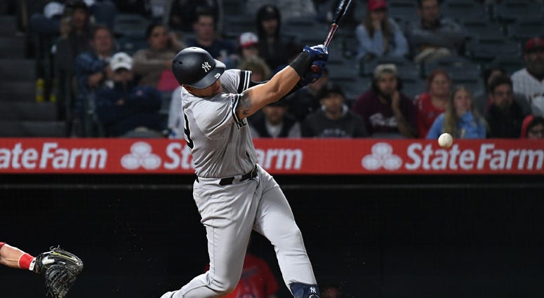 Yankees third baseman Gio Urshela hits an RBI single against the Los Angeles Angels in the 14th inning on April 22, 2019, at Angel Stadium of Anaheim. Yankees third baseman Gio Urshela hits an RBI single against the Los Angeles Angels in the 14th inning on April 22, 2019, at Angel Stadium of Anaheim.