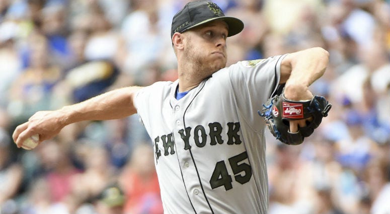 Zack Wheeler throws a pitch in the first inning against the Milwaukee Brewers at Miller Park in Milwaukee. Zack Wheeler throws a pitch in the first inning against the Milwaukee Brewers at Miller Park in Milwaukee.