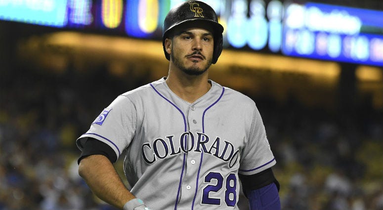 Nolan Arenado returns to the dugout after striking out with bases loaded in the first inning of the game against the Los Angeles Dodgers at Dodger Stadium. Nolan Arenado returns to the dugout after striking out with bases loaded in the first inning of the game against the Los Angeles Dodgers at Dodger Stadium.