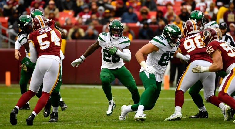 New York Jets running back Le'Veon Bell (26) rushes the ball against the Washington Redskins during the second half on Nov 17, 2019 at FedExField. New York Jets running back Le'Veon Bell (26) rushes the ball against the Washington Redskins during the second half on Nov 17, 2019 at FedExField.