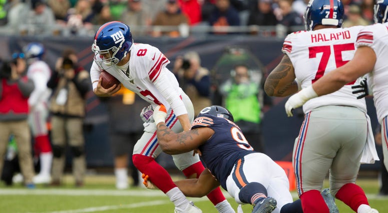 Daniel Jones is sacked by Chicago Bears defensive tackle Nick Williams in the third quarter at Soldier Field Nov 24, 2019; Chicago, IL Daniel Jones is sacked by Chicago Bears defensive tackle Nick Williams in the third quarter at Soldier Field Nov 24, 2019; Chicago, IL