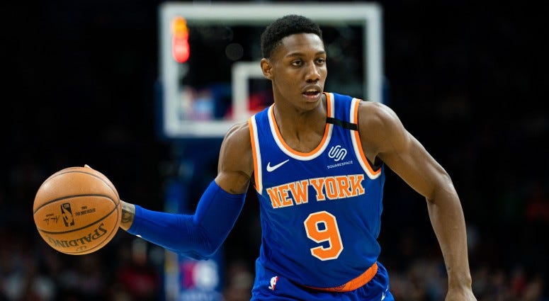 New York Knicks guard RJ Barrett (9) passes the ball against the Philadelphia 76ers during the first quarter on Feb 27, 2020 at Wells Fargo Center. New York Knicks guard RJ Barrett (9) passes the ball against the Philadelphia 76ers during the first quarter on Feb 27, 2020 at Wells Fargo Center.