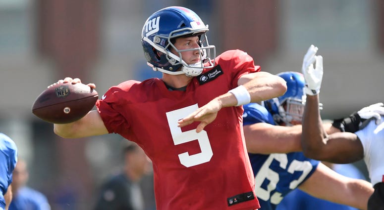 Giants quarterback Davis Webb passes during training camp Aug. 1 in East Rutherford, New Jersey. Giants quarterback Davis Webb passes during training camp Aug. 1 in East Rutherford, New Jersey.