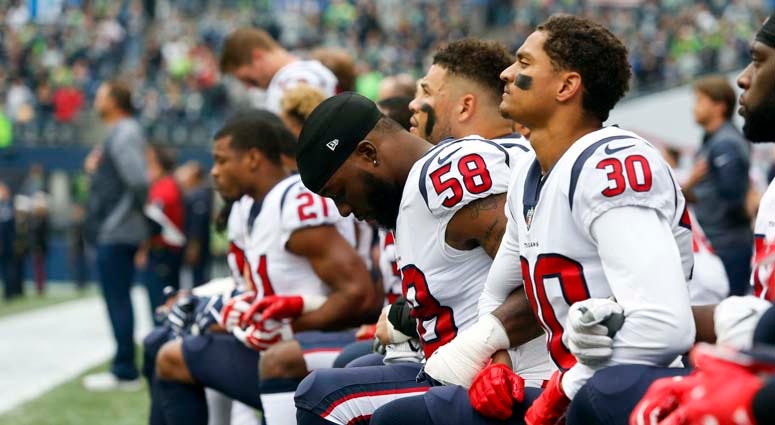 Some members of the Houston Texans kneel during the national anthem on Oct. 29, 2017. Some members of the Houston Texans kneel during the national anthem on Oct. 29, 2017.